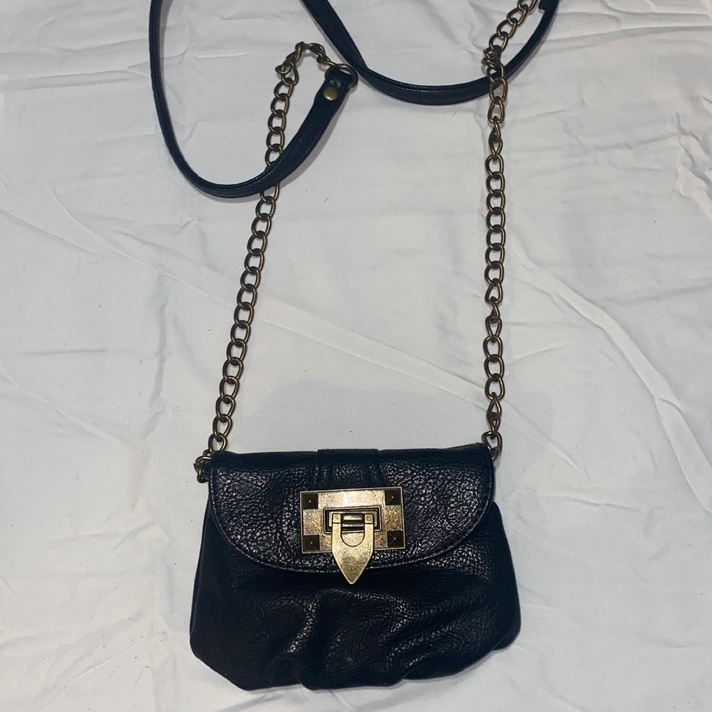 Black and brass color wallet purse